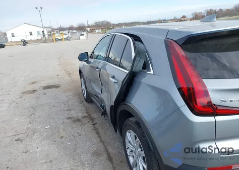 2023 Cadillac Xt4 Fwd Luxury from USA, damaged, VIN 1GYAZAR48PF172137